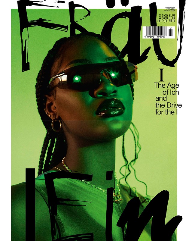 Magazine cover featuring a woman with sunglasses and braids, shot in green lighting with bold typography.