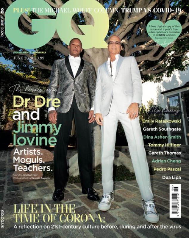 GQ magazine cover featuring Dr. Dre and Jimmy Iovine in suits standing outdoors against a large tree and a building during the day.