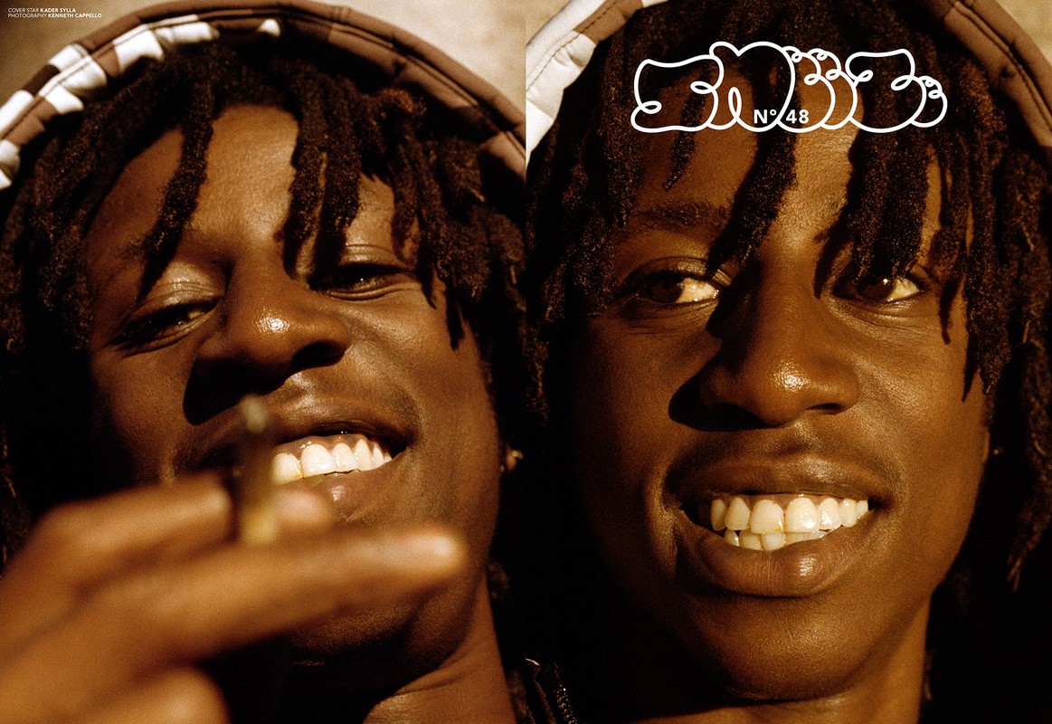 Close-up portrait of two young African American men with dreadlocks, one smoking, in a dual-panel studio fashion shot with text overlay.