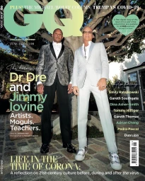 Dr. Dre and Jimmy Iovine standing outdoors against a tree, photographed by Kenneth Cappello for GQ magazine cover.