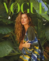 Gisele Bündchen on Vogue magazine cover wearing a patterned garment amidst lush green tropical foliage.