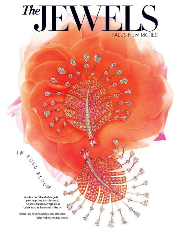 Jewelry earrings displayed on a peach-colored rose backdrop, featured in The Jewels magazine, highlighting Fall's New Riches.