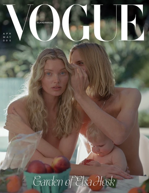 Vogue cover featuring two adults and a baby outside. The adult on the left has blonde hair, and the baby is in front.