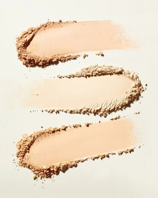 Beige face powder swatches arranged in three rows on a neutral background, suitable for makeup, beauty, and cosmetic visuals.