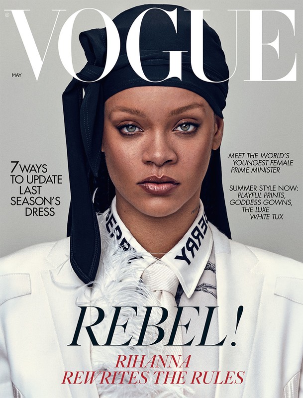 Close-up magazine cover featuring Rihanna wearing a headscarf and white blazer, set against a neutral background with bold typographic elements.