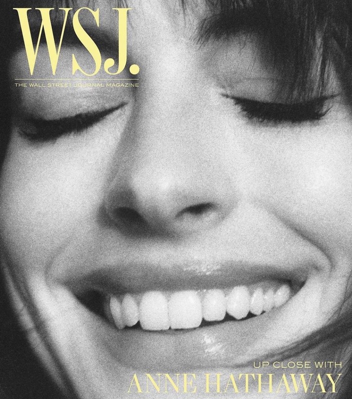 Close-up studio shot of Anne Hathaway on the WSJ magazine cover, featuring a warm black and white portrait with visible text and title.