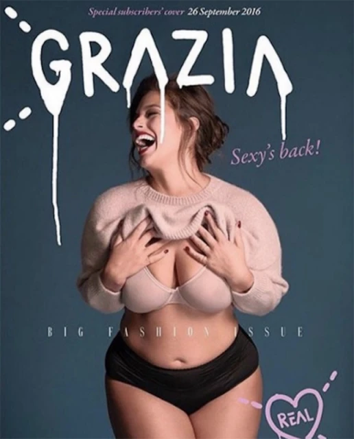 Magazine cover featuring plus-size model Ashley Graham wearing a beige sweater and black underwear against a blue background.