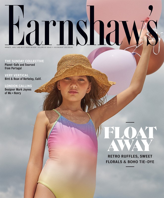 Magazine cover featuring a young girl wearing a straw hat and a pastel-colored swimsuit, holding several balloons against a sky background.