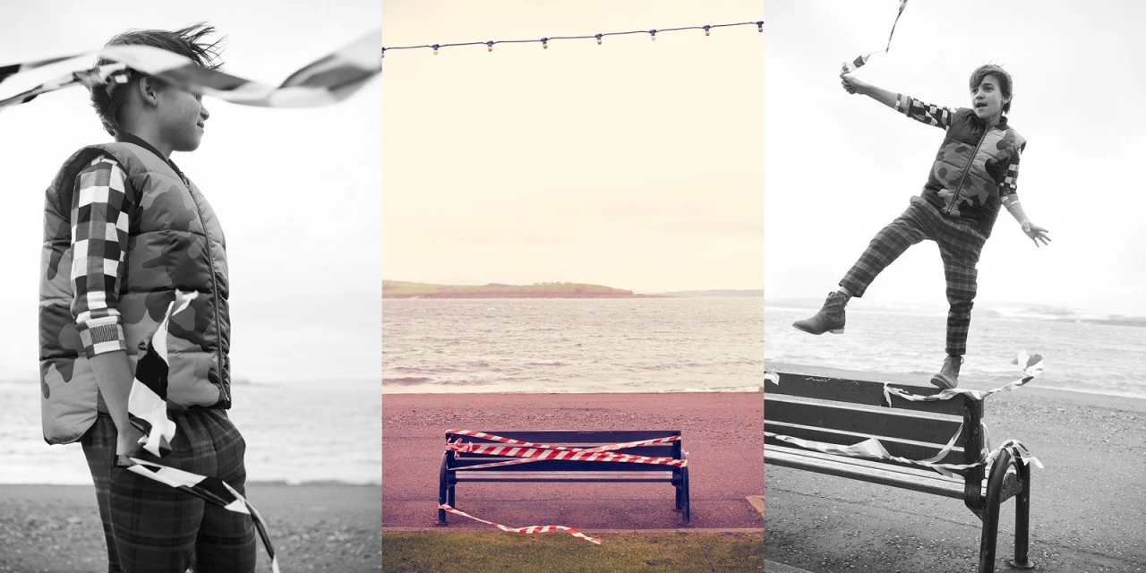 Monochrome triptych features a child in a camo vest holding ribbon, a bench with tape, and a child on a bench, all by a beach.