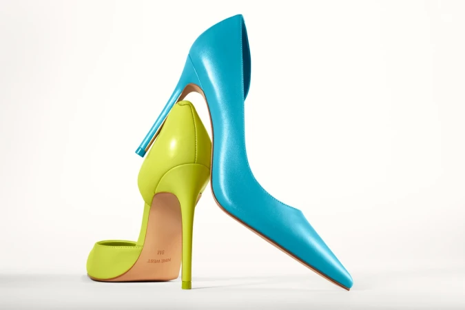 Turquoise and chartreuse Nine West high heels isolated on a white background, studio shot, fashion forward footwear.