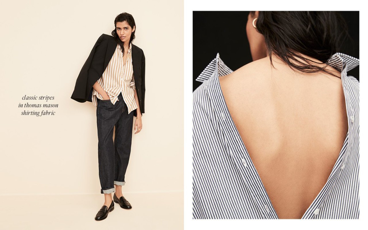 A fashionable adult female poses in a black blazer, striped shirt, and dark jeans, paired with black loafers, against a cream backdrop.