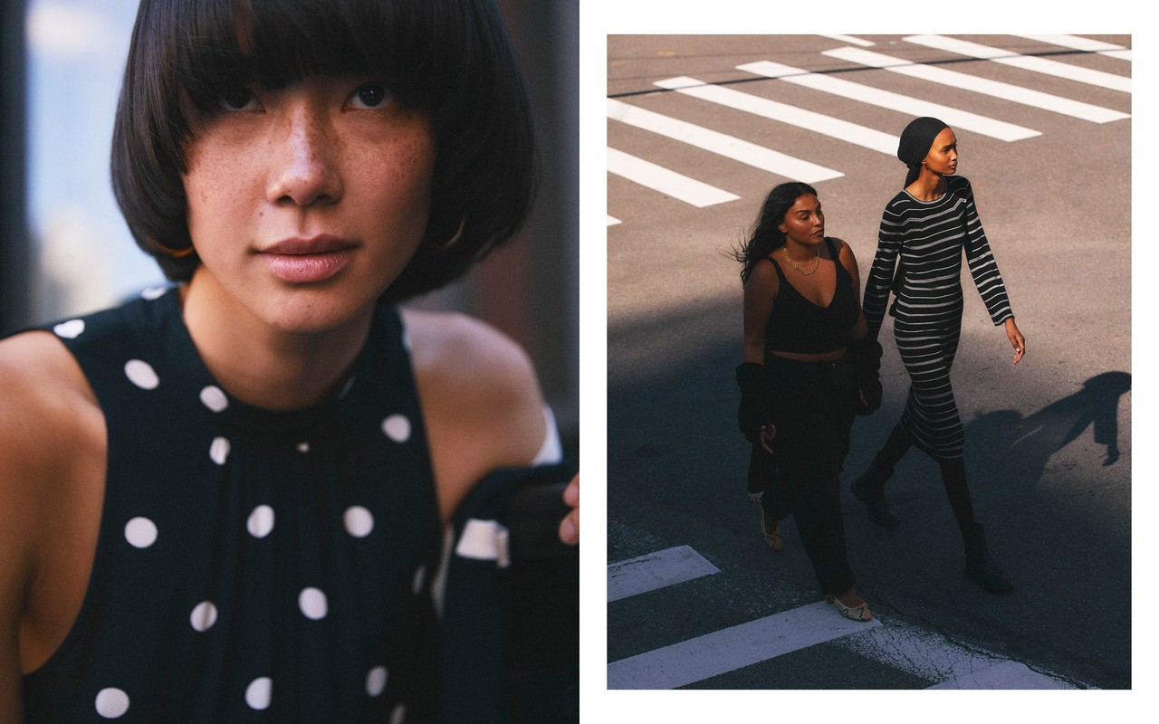 Two dark-haired women walk across a crosswalk on a sunny day, one in a black dress, one in a striped dress, with close-up studio portrait.