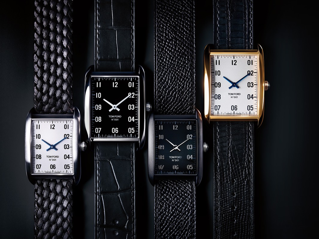 Four Tom Ford timepieces are displayed against a black background, showcasing a collection of luxury watches with unique straps and faces.