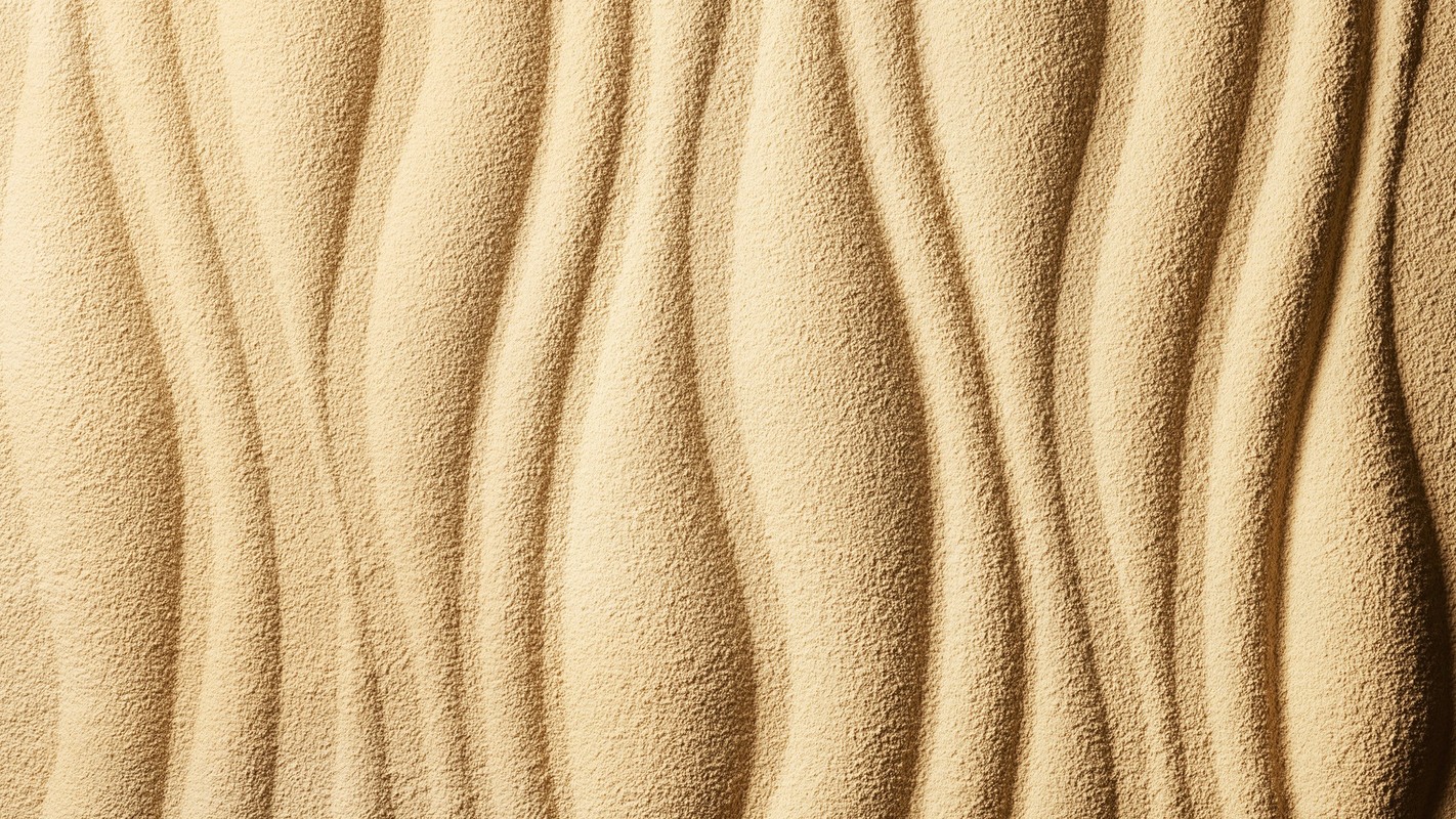 Abstract tan waves pattern texture. Full-frame sand-like wavy textured surface. Minimalist background in neutral beige tones.