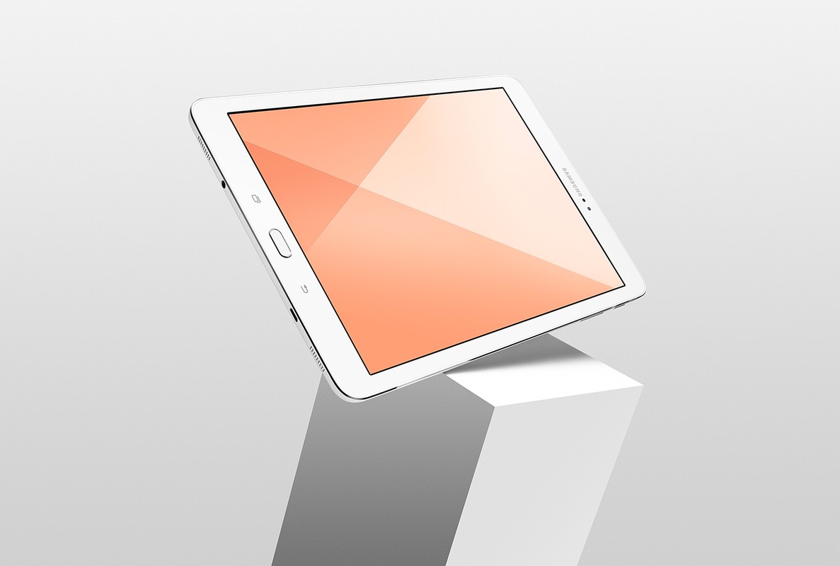 Samsung tablet on a white cube against a white background, showcasing its sleek design and vibrant screen. Minimalist tech product shot.