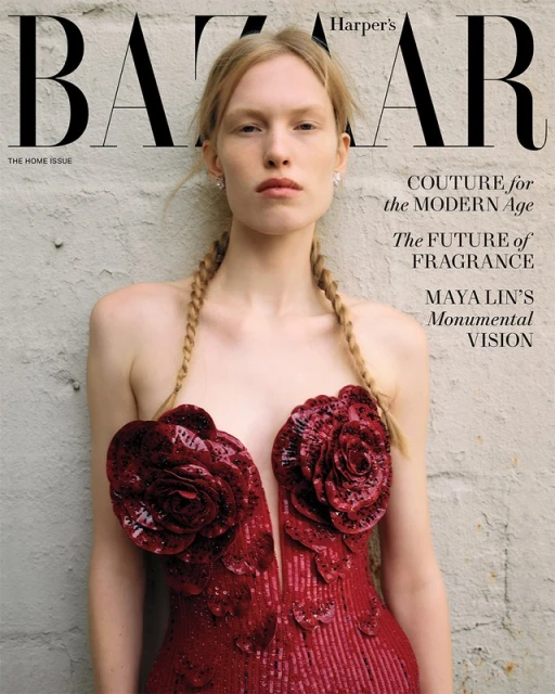 Harper's Bazaar cover featuring a woman in a red floral dress, posing against a textured wall, fashion editorial, magazine cover.