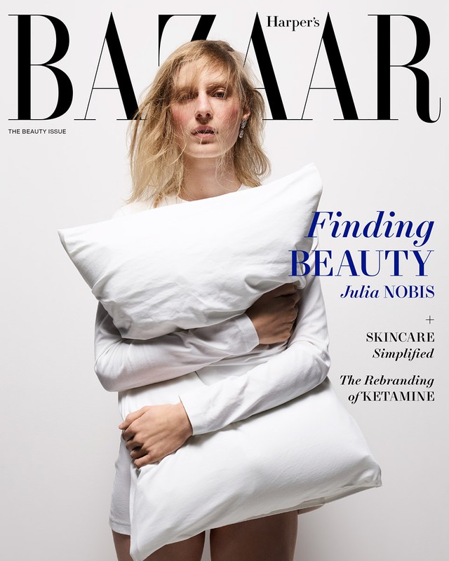 Magazine cover featuring a woman with blonde hair holding a white pillow, with 'Harper's Bazaar' and 'Finding Beauty' text overlays.