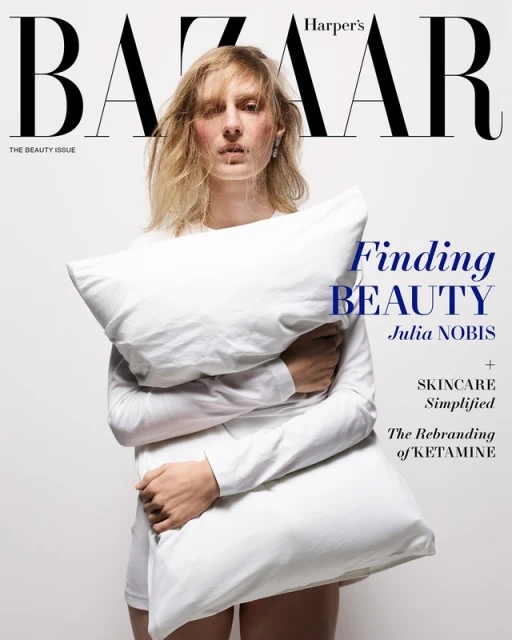 Magazine cover featuring a woman with blonde hair holding a white pillow, with 'Harper's Bazaar' and 'Finding Beauty' text overlays.