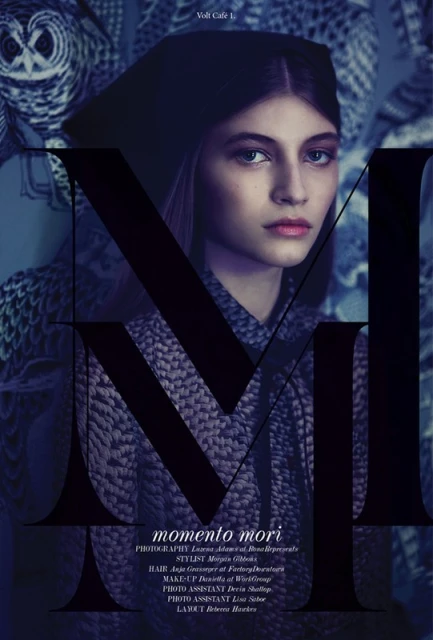 Fashion portrait of a young woman with dark hair and hat, textured clothing, against an owl-patterned background with large sans-serif type overlay.