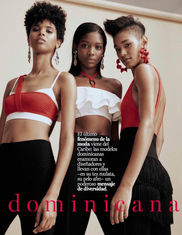Three diverse fashion models in a studio setting, wearing red and white tops with black pants. The image has a warm tone and editorial feel.