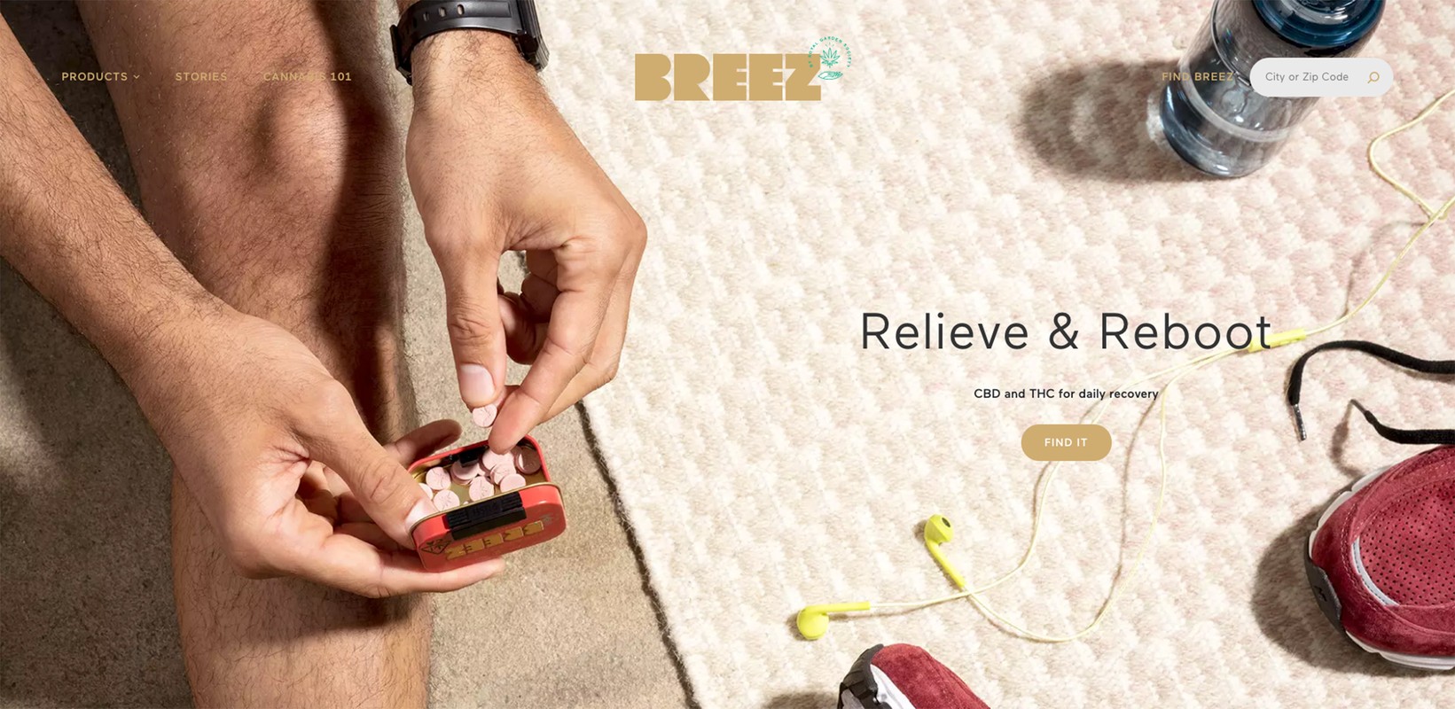 Person holding pills, bottle of water, running shoe, and ear buds on a textured surface. CBD wellness concept image for Breez brand.