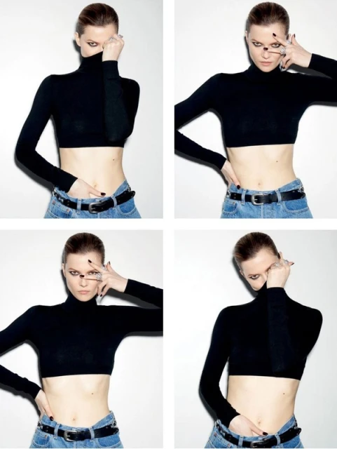 A woman in a black crop top and light wash jeans is posing against a white wall in a studio setting with a variety of poses.
