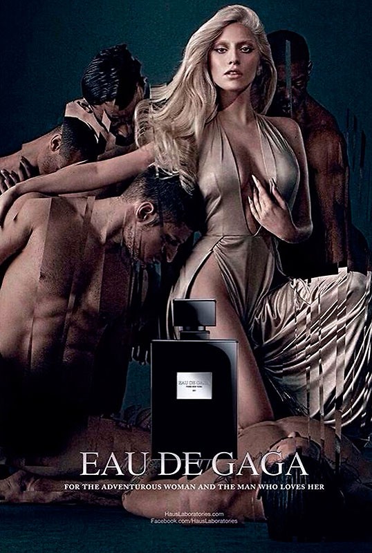 Blonde woman in plunging dress with multiple shirtless men in artistic perfume ad for Eau de Gaga fragrance bottle in foreground.