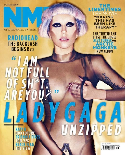 Lady Gaga on the cover of NME magazine. She wears a sheer top and short purple wig, set against a yellow magazine background.