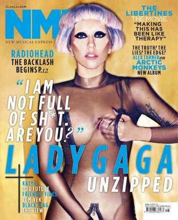 Lady Gaga on the cover of NME magazine. She wears a sheer top and short purple wig, set against a yellow magazine background.