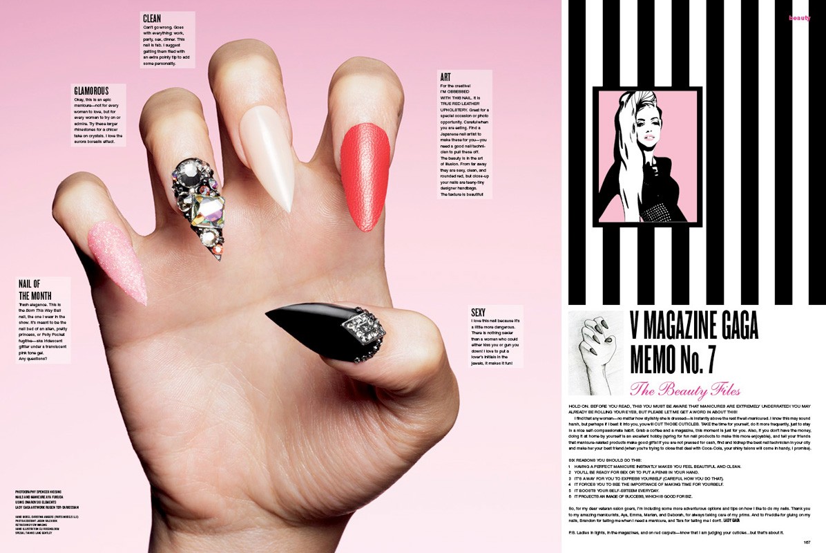 Close-up of a hand with long, decorated nails, showcasing various nail art designs and polished fingers against a pink background.