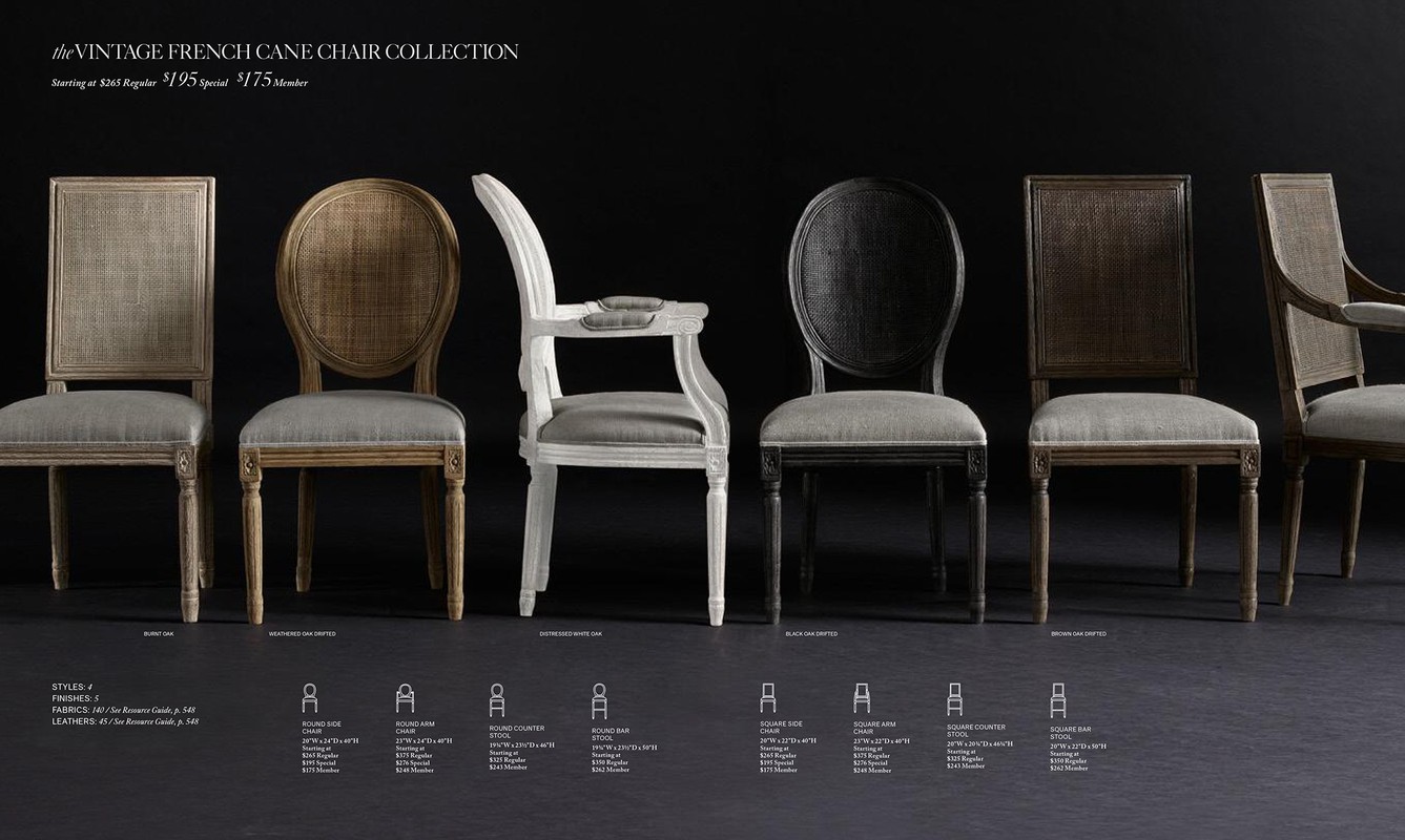 Collection of vintage French cane chairs in various wood finishes including oak, displayed against a dark backdrop.