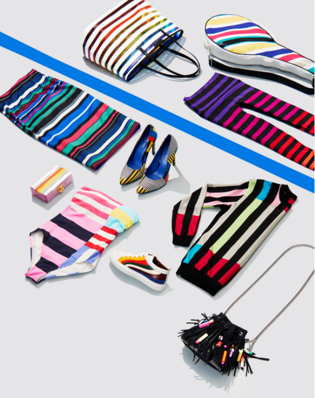 Fashion layout: Striped tote bag, sweater, skirt, shoes, leggings, purse with fringe, and striped accessory case on white surface.