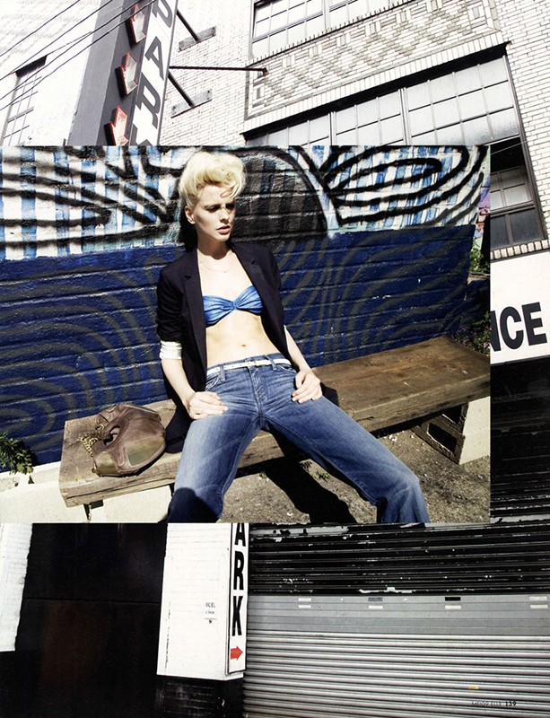 Stylish woman posing on a bench in jeans, crop top, and blazer, with graffiti wall background, collage style and urban setting.