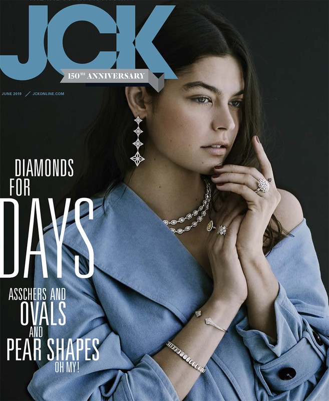 JCK magazine cover featuring a young woman with shoulder-length brunette hair wearing multiple diamond necklaces, earrings, rings, and bracelets.