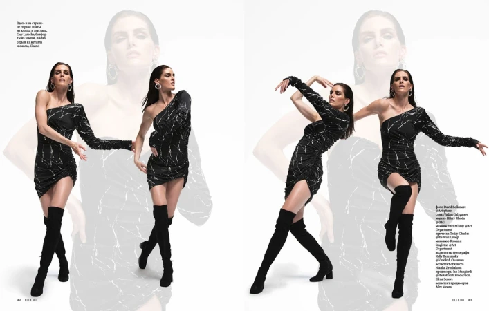 A model strikes a pose in a black one-shoulder mini dress and black thigh-high boots against a white backdrop with ghosted figures.