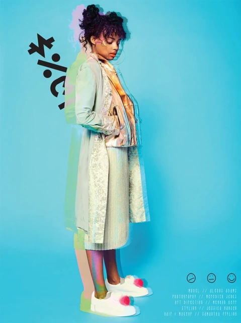 Full shot of a Black woman in a pastel jacket and skirt, wearing white platform shoes in a blue studio with graphical elements.
