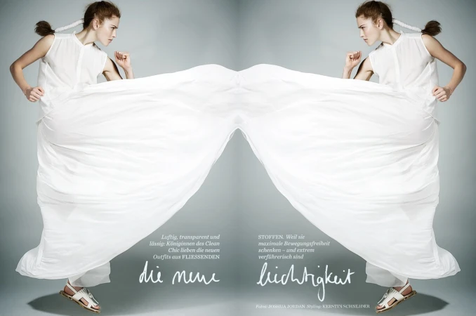 Fashion shot of two young women with flowing white dresses and sandals. The models are mirror images against a gradient grey background.
