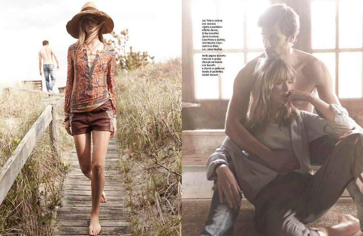 Editorial fashion shot of a woman in a hat and shorts walking on a boardwalk, with a couple embracing indoors in the background.