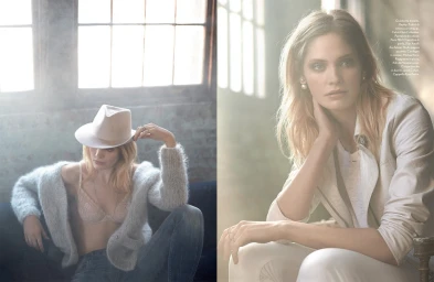 Two fashion models posing indoors near large windows, featuring soft lighting and editorial styling with hair by Stephen Rose