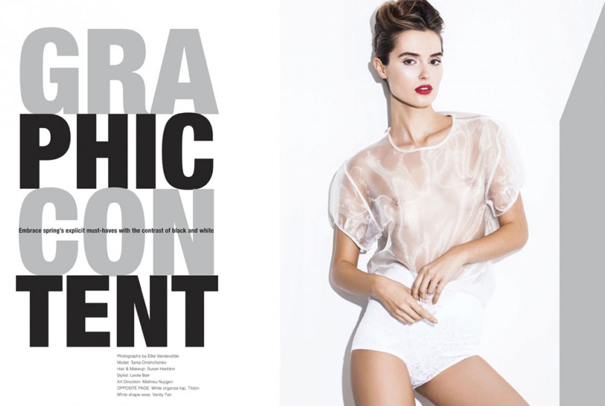 Fashion editorial shot of a woman in white underwear and sheer top, posing against a bright white background with large graphic text.