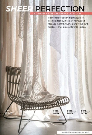 Interior scene featuring a wicker chair in front of sheer curtains, creating a soft, light-filled ambiance, perfect for home decor inspiration.