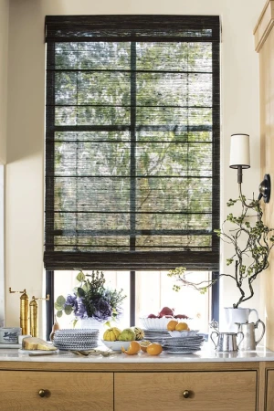 Interior view of a kitchen counter with fruit, flowers and window in the background. Interior design, still life scene.