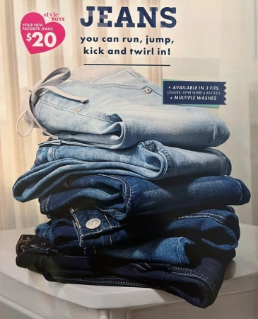 Stack of folded denim jeans on a white table, advertising Style Buys for $20, promoting the availability in three fits and multiple washes.