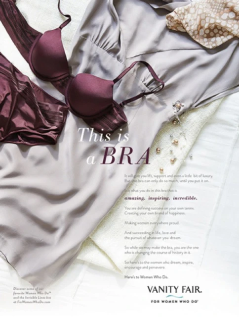 Burgundy bra and silk shirt on a white surface. Vanity Fair campaign featuring lingerie and clothing.