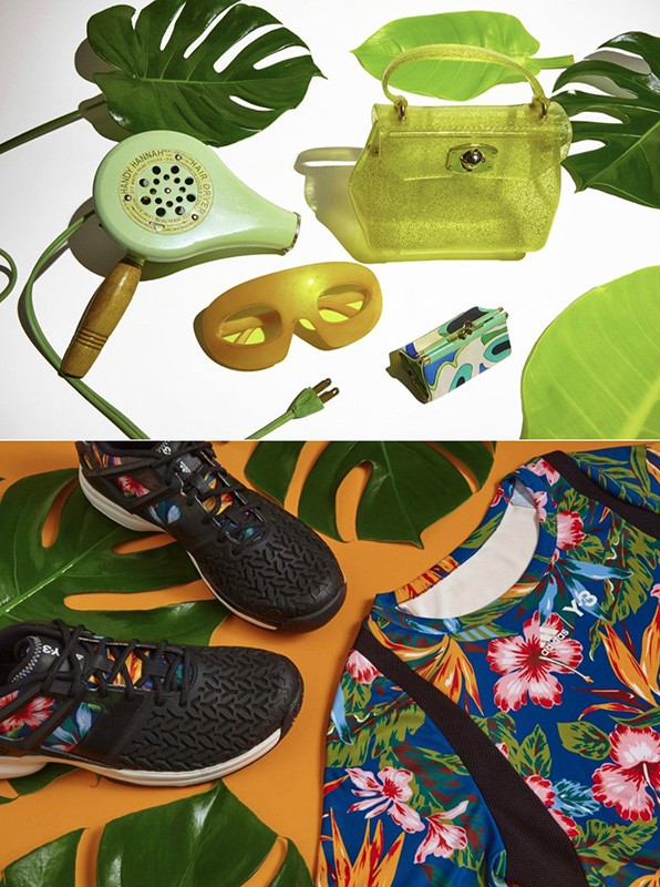 Still life of retro hair dryer, sunglasses, purse, and athletic wear with tropical leaves on white and orange backgrounds.