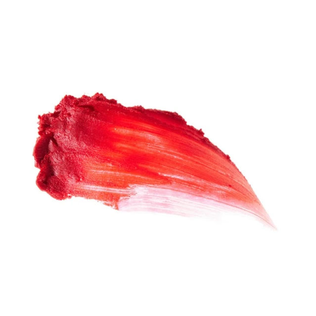 Isolated close-up of a red lipstick smear with a soft texture and a glossy finish against a clean white backdrop.