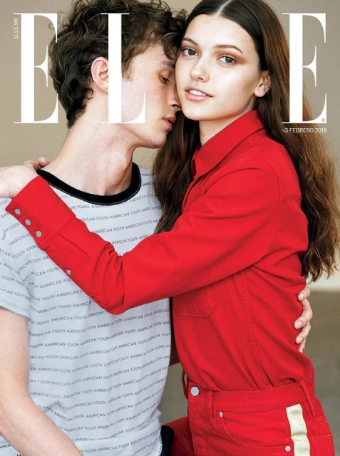 Elle magazine cover featuring a young couple posing indoors, with the female model in red and the male model in a printed tee.