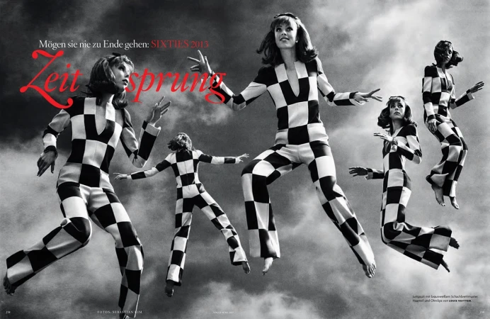 Fashion editorial shot of five women in black-and-white checkered jumpsuits, posing mid-air against a cloudy sky backdrop, 1960s-inspired.