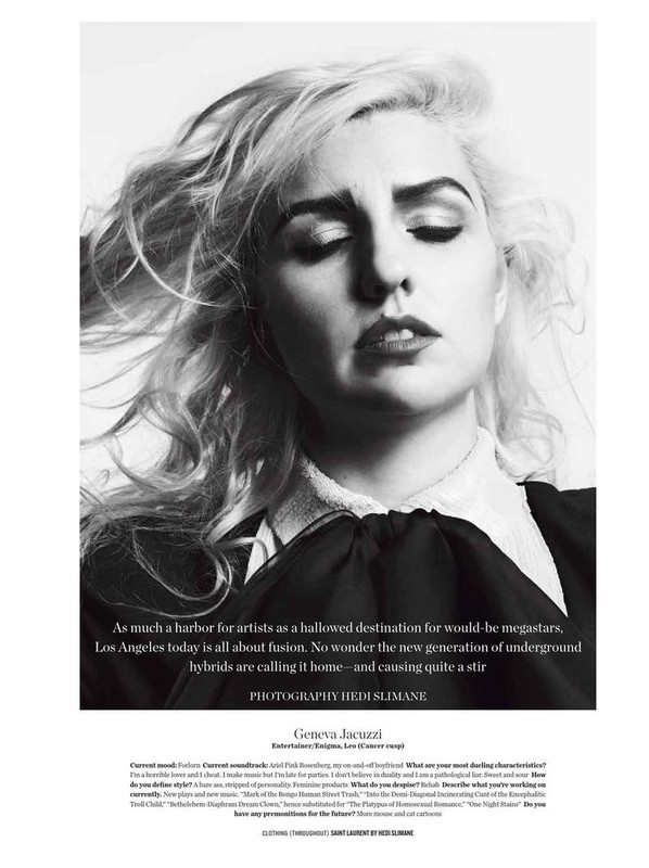 Monochrome portrait of a blonde woman with her eyes closed wearing a dark top with a bow collar against a plain light background