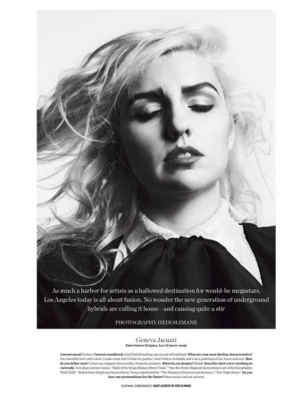 Monochrome portrait of a blonde woman with her eyes closed wearing a dark top with a bow collar against a plain light background